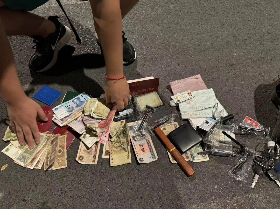 外地旅客遗失重要财物     古丈青年拾金不昧暖人心