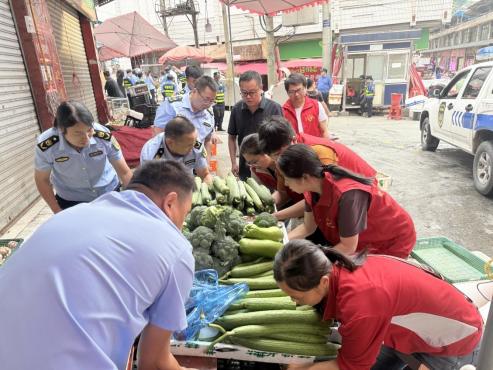 古阳镇车站社区：柔性执法暖心整治 让市场环境焕然一新